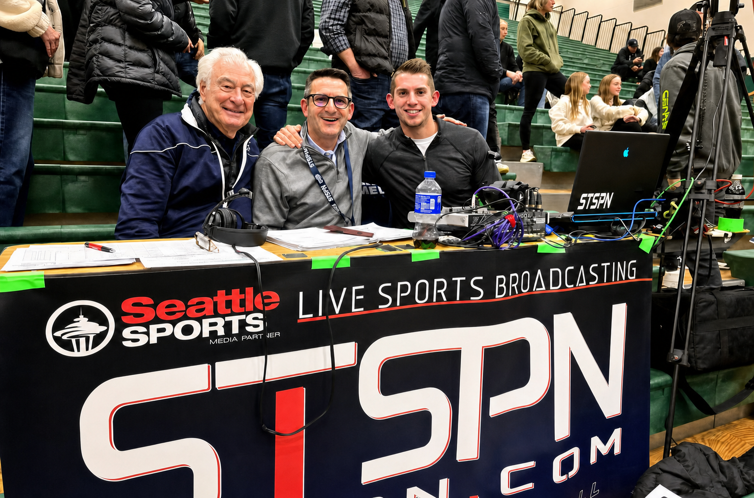 Ron Henthorn with colleagues at the STSPN and Seattle Sports broadcast table
